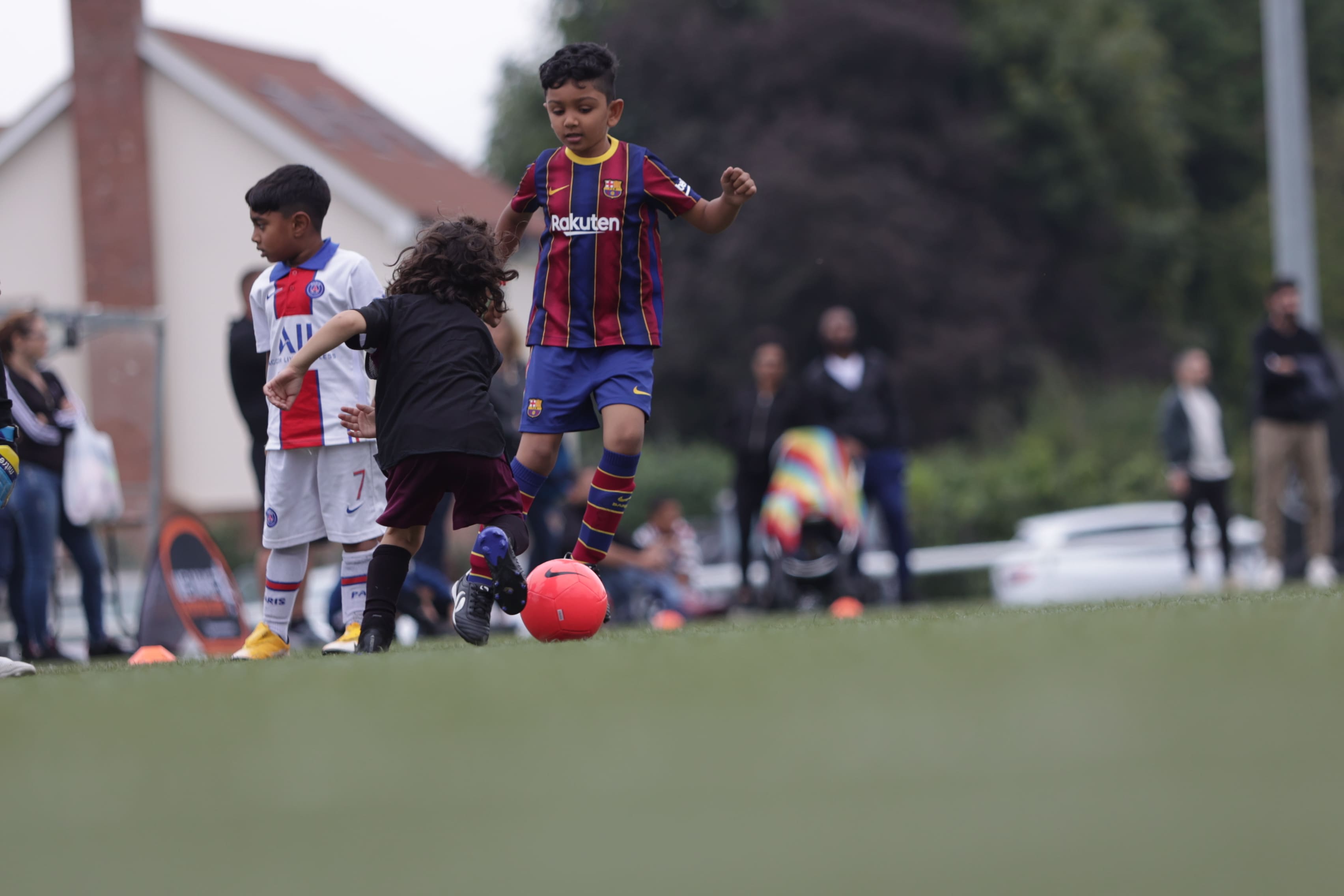 Confident child enjoying football in a safe, inclusive environment